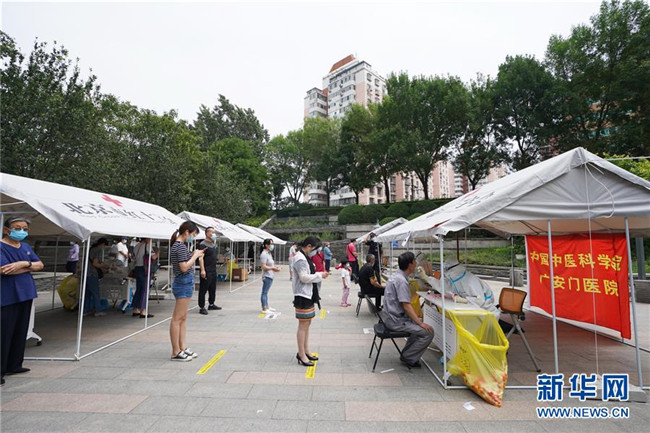 （新華全媒頭條·圖文互動(dòng)）（5）首都再戰(zhàn)“疫”，難忘40天——寫在北京應(yīng)急響應(yīng)級(jí)別降級(jí)之際 